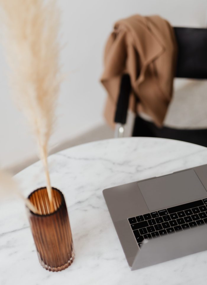 kaboompics_macbook-pro-15-laptop-and-iphone-11-pro-on-a-marble-table-13723